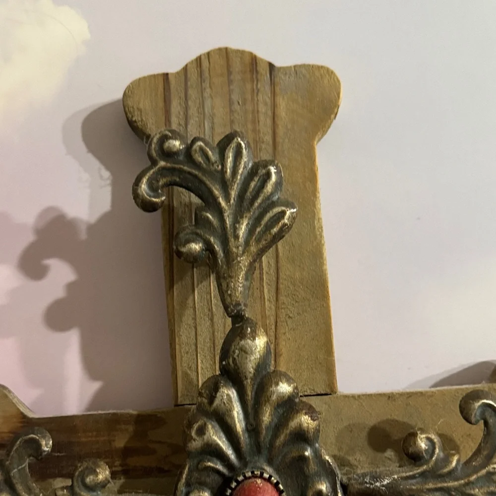 Rustic Wooden Cross with Golden Accents and Red Gem